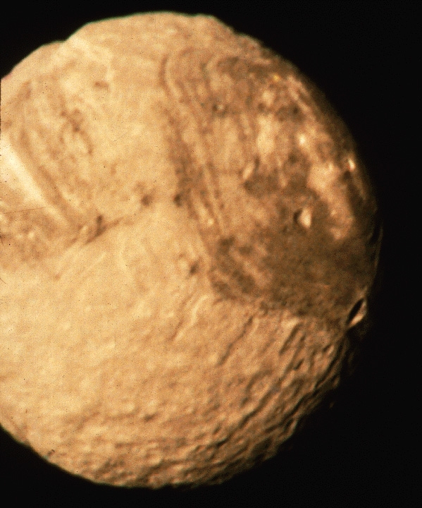 Miranda, one of the 5 satellites of Uranus. Credits: NASA